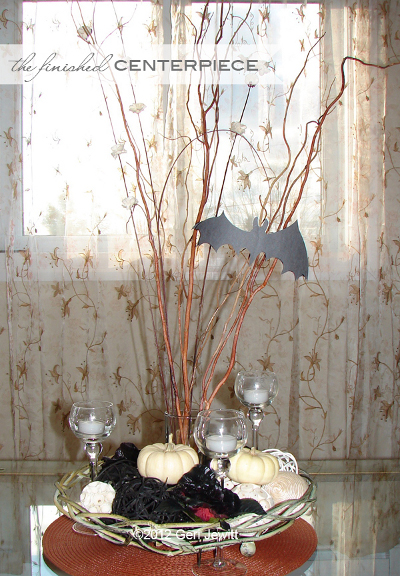 centros de mesa con ramas de arbol para halloween 