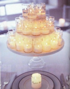 grupos de velas como centros de mesa
